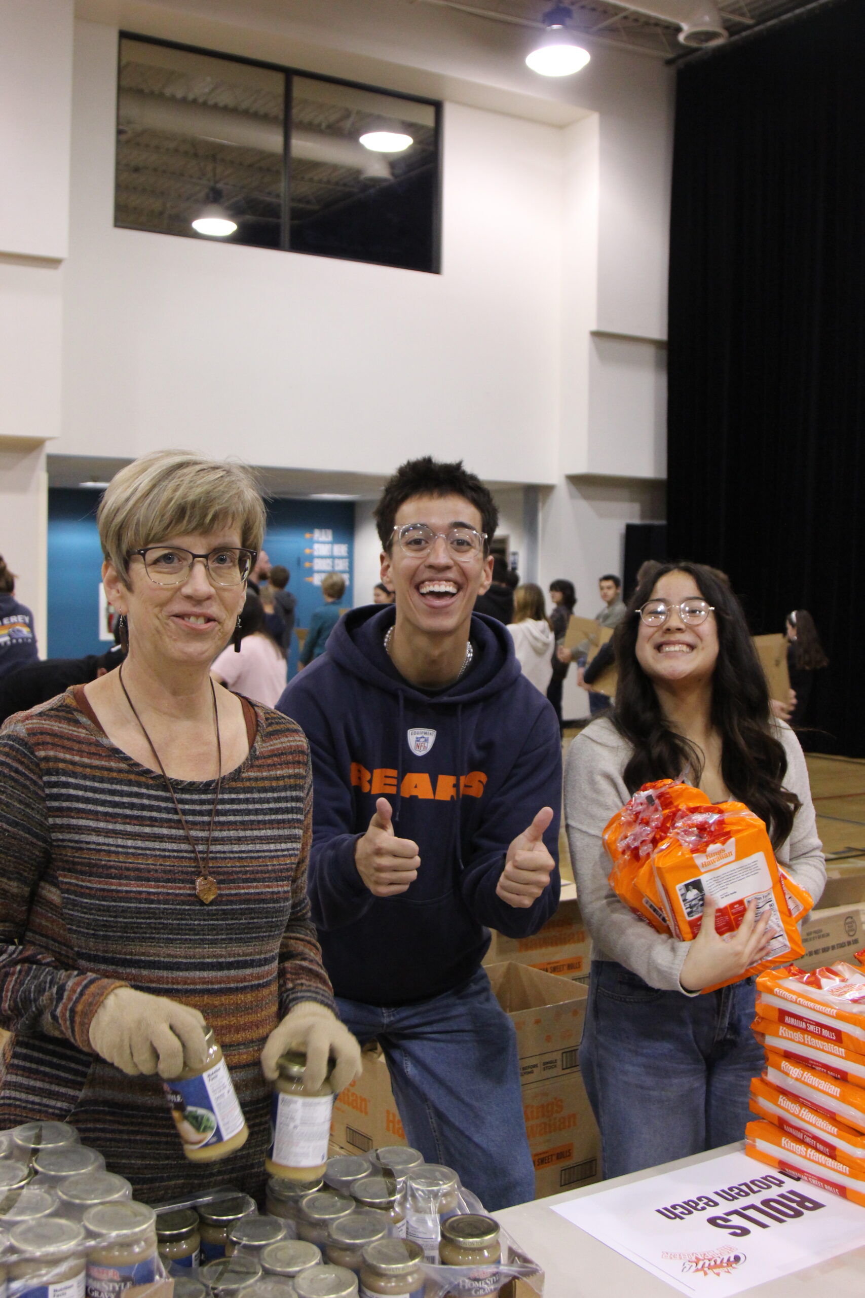 Grace Students participating in a Giftember packing event